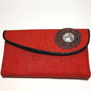 Handmade Orange Woven Clutch with Black Trim and Beaded Giraffe Medallion